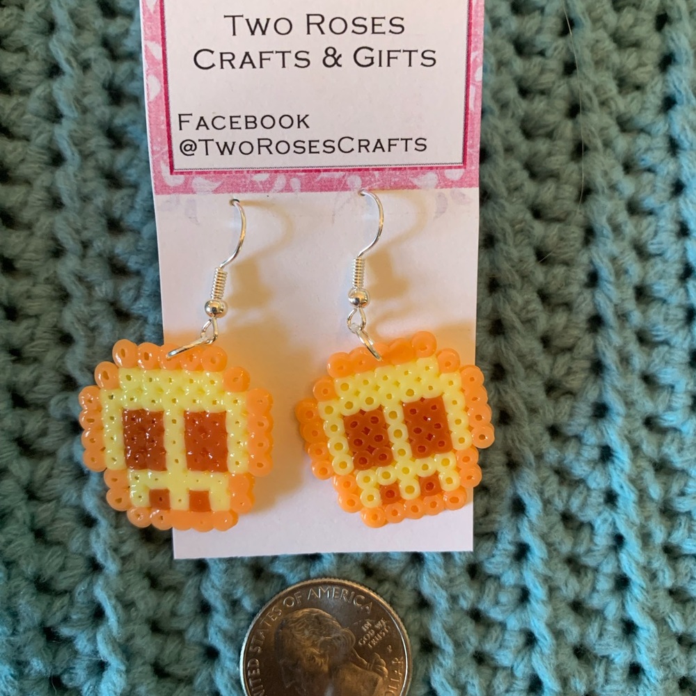 Golden skull earrings